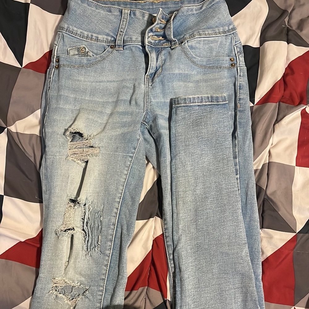 Light blue skinny ripped jeans size 1/25 used to good condition